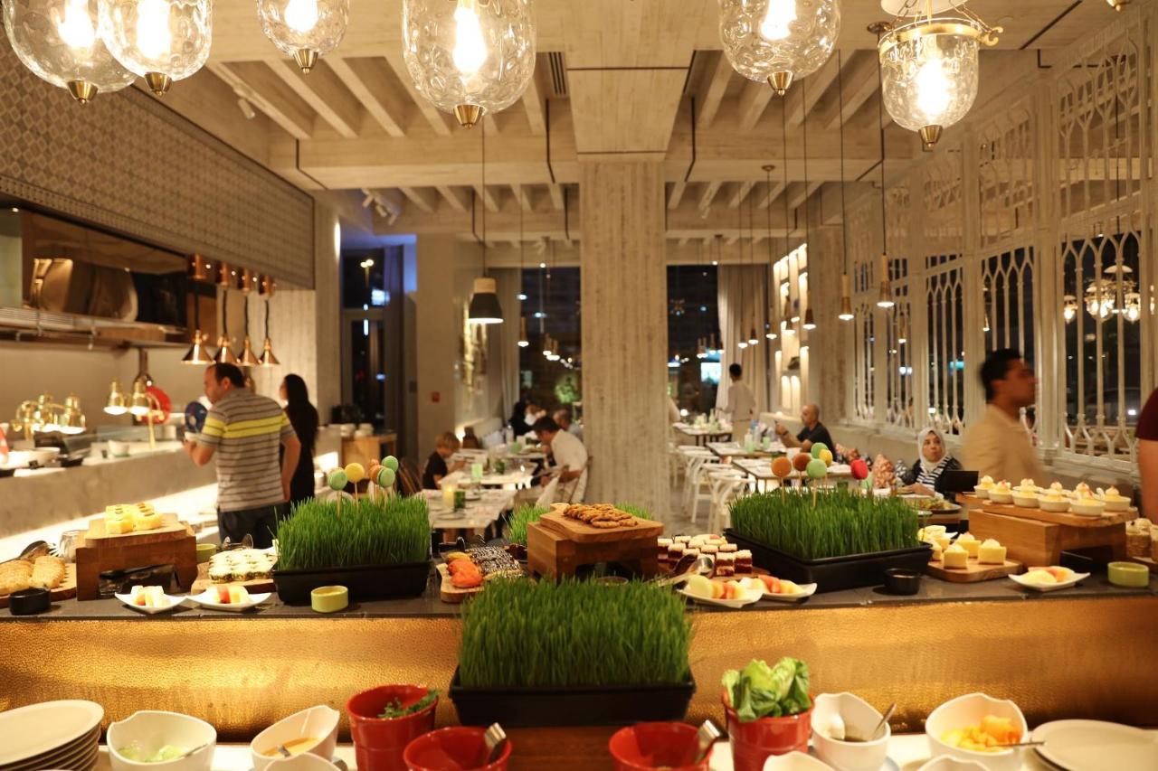 Dusit D2 Kenz Hotel Dubai Exterior foto